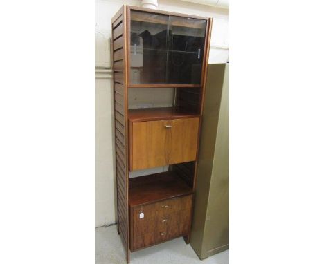 A STAPLES LADDERAX ROSEWOOD STACKING SYSTEM, 1980's, comprising a bureau with fall front, three drawer unit and cupboard with