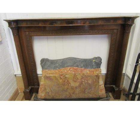 A GEORGIAN REVIVAL MAHOGANY FIRE SURROUND, c.1900, the moulded edged serpentine shelf and plain frieze with rounded protrudin