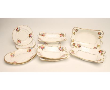 A SPODE PORCELAIN PART DESSERT SERVICE, c.1810, the borders moulded with flower panels intersected with polychrome painted po