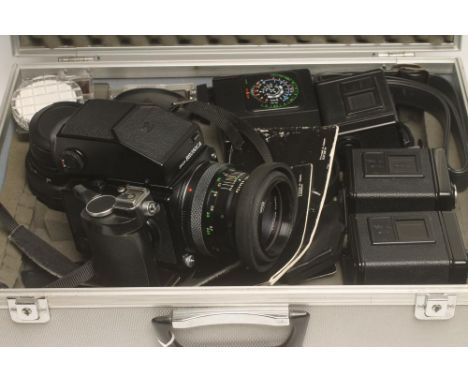 A ZENZA BRONICA ETRS CAMERA, with 1:28 f=50mm lens, a 1:28 f=75mm lens, flash, filters and spares contained in a hard carryin