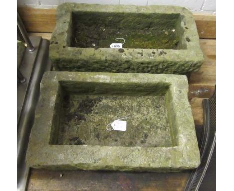 A SMALL OBLONG SANDSTONE TROUGH, 20 1/2" x 7", together with another similar, 17 1/2" x 11" x 7" (2) Est. plus 21% premium in