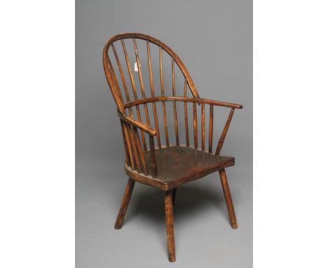 AN ASH AND ELM BOW BACK WINDSOR ARMCHAIR, 18th century, possibly West Country, of stick back form, the arm bow with outward s