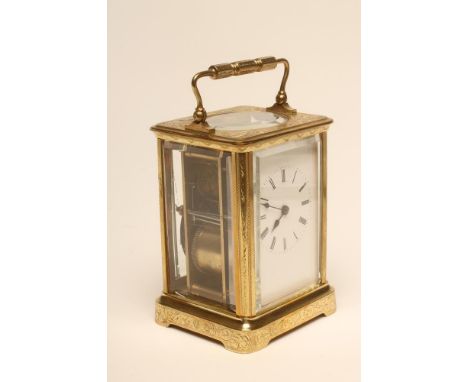 A BRASS CASED CARRIAGE CLOCK, last quarter 19th century, the gong striking twin barrel movement regulated by a platform lever