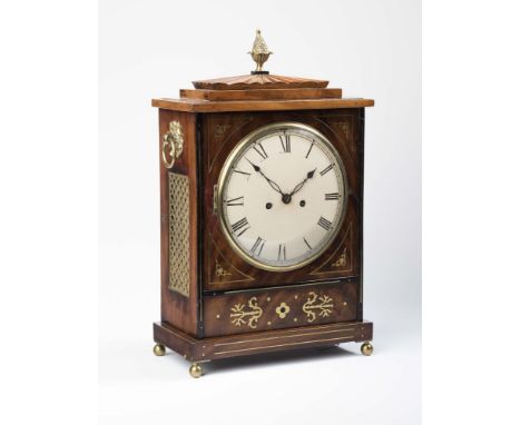A REGENCY MAHOGANY AND BRASS INLAID BRACKET CLOCK, the double chain and fusee repeater strike on bell movement with leaf chas