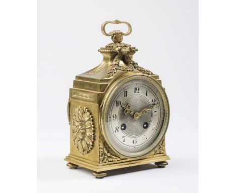 A PENDULE D'OFFICIER BRASS CASED TRAVELLING CLOCK, the twin barrel movement striking on a gong on the hour and half hour, and