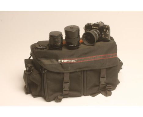 A LEITZ SUMMILUX-R 1:1.4/35 LENS with B+W filter, a Leitz Summicron-R 1:2/90 lens with Leitz E55 filter, together with a Cont
