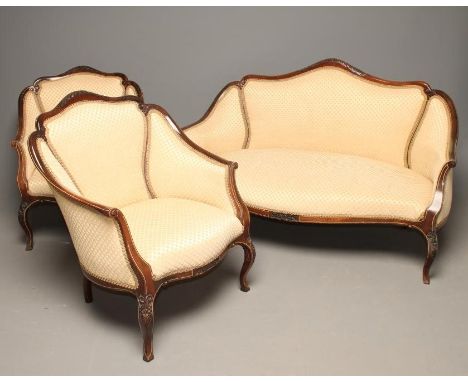 A LATE VICTORIAN MAHOGANY SHOW-WOOD FRAME SALON SUITE with bone line stringing and upholstered in a yellow trellis pattern fa