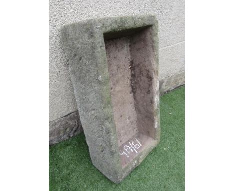 A SANDSTONE TROUGH of oblong form, well cut, 29" x 15 1/2" x 8 1/2" (Est. plus 21% premium inc. VAT)