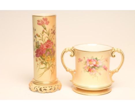 A ROYAL WORCESTER CHINA PRESENTATION BLUSH IVORY LOVING CUP, c.1900, of slightly waisted cylindrical form with two double "C"