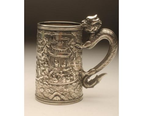 A CHINESE/CANTON SILVER MUG, Kecheong (1840-1870), of tapering cylindrical form with hollow "S" scroll dragon handle, the dou