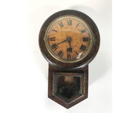 A H.A.C drop dial wall clock (Wusttemberg), applied with label, mounted in wooden case the glazed lower panel revealing the p