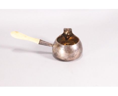 A small silver brandy pan, of plain rounded bellied form with gilt interior and an ivory handle, London 1889, 4cm high, 73 gr