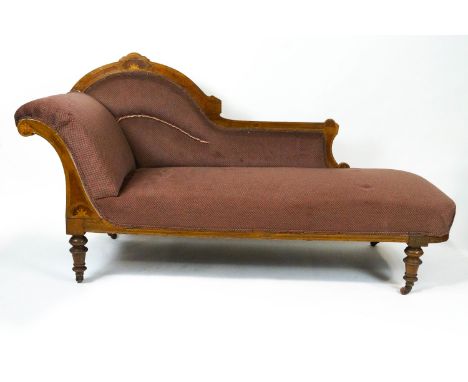 A Victorian walnut and boxwood inlaid show frame chaise longue on turned tapering legs and ceramic casters, 93.5cm high (over