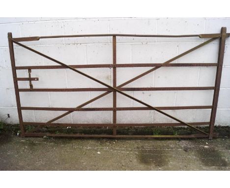An iron six bar gate 115cm  x 215cm