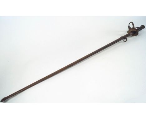 A french 19th century issue sword with shell capped tripartite hand guard with laurel leaf decorated pommel and a carved wood