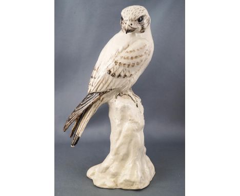 Four studio pottery models of birds of prey, incised CL monogram, arrow and tiles, comprising : a Kestrel, Peregrine Falcon, 