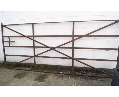 An iron six bar gate 123cm x 282cm