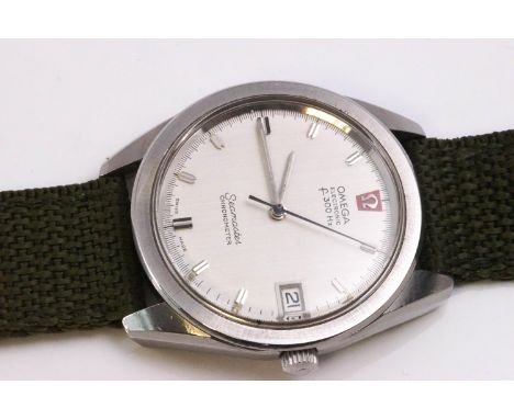 A stainless steel Omega Seamaster wristwatch. Dial signed omega electronic F 300hz - Seamaster chronometer. Green fabric stra