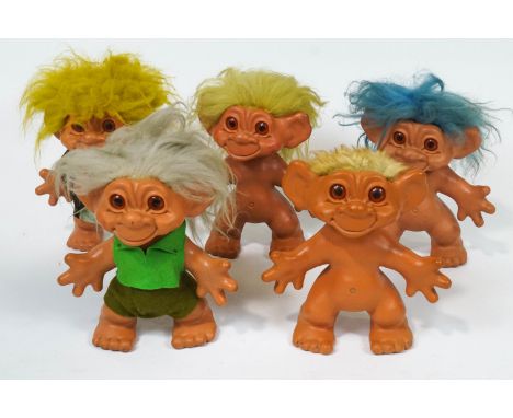 Five vintage Dam Things large trolls,marked C.DAM THINGS/EST.1964, two wearing felt clothing, 29.5cm high.