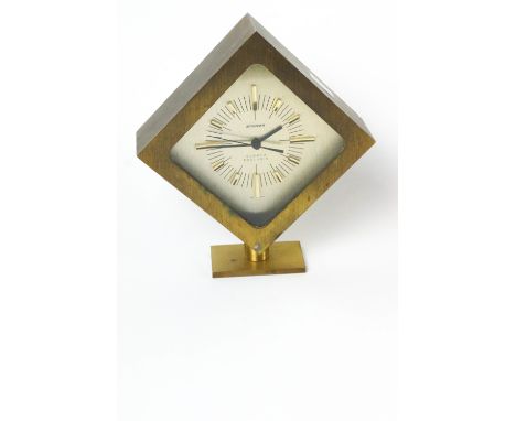 A boxed Staiger quartz brass cased clock, with baton dial and receipt, 21cm high