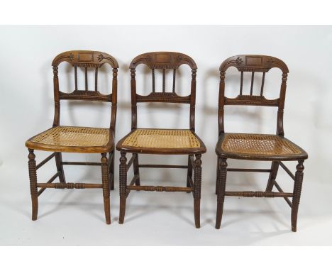 A set of six 19th century bobbin turned chairs, each with caned seats