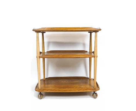 An Ercol light elm drinks/tea trolley, two tier, on casters, 76cm high x 71cm wide x 46cm deep