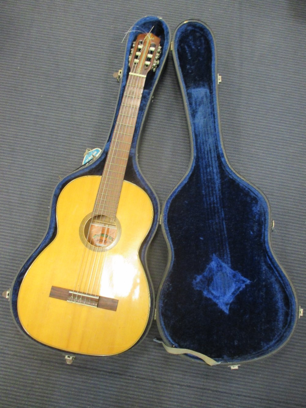 A Japanese made classical guitar in case in Cheffins Fine Art