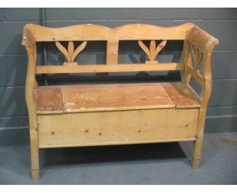 A Continental pine bench, 115cm wide  