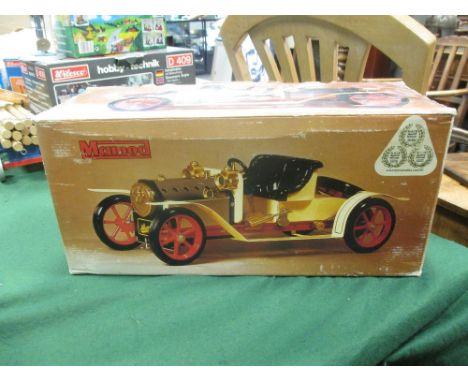 A Mamod spirit fired live steam car, boxed and a TE.1a Mamod Showman's engine, boxed (2)  