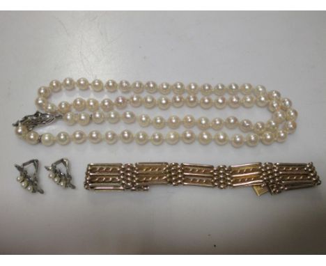 A five bar gate bracelet stamped '9' , 23.5g together with a single row of cultured pearls and a pair of pearl and marcasite 
