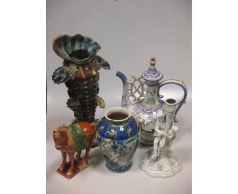 A Persian vase, a Portuguese Persian style ewer, a Sitzendorf white glazed figural candlesticks, Tang style model of a horse,