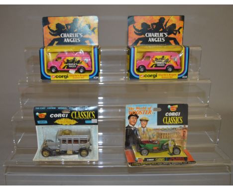 Four boxed Corgi diecast models including 2 x 434 Charlie's Angels Custom Vans in pink together with two from the 'Classics' 