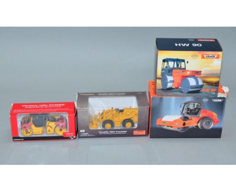 Four boxed  diecast model Construction Vehicles in 1:50 scale by Motorart, Norscot and others, including a WSI Hamm HW90 Roll