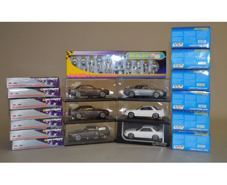 Quantity of slot cars and related accessories: six HPI Racing slot cars; Scalextric Silver Pit Crew; six Scalextric Digital C