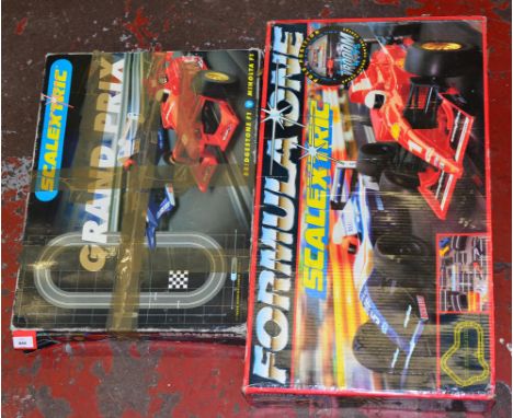Two boxed Scalextric Slot Car Sets, 'Grand Prix' and  'Formula One', condition of items and outer packaging varies. (2)