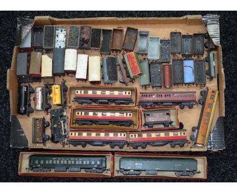 Four boxed Trix TTR carriages and a boxed Goods Brake Van, generally F/G in P/F boxes  together with an engine and  a quantit