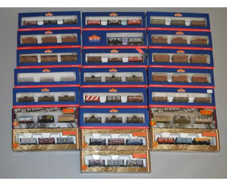 OO gauge. 22 x Bachmann rolling stock three-packs, some weathered. E and boxed.