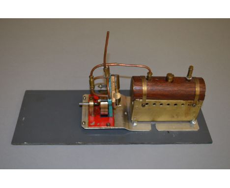 Scratch built Horizontal steam engine. Mounted on a 36cm by 14cm plastic base.