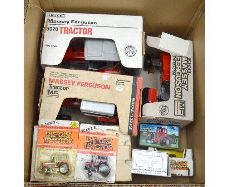 A good quantity  of boxed agricultural  diecast models mainly by ERTL, in vavrious different scales. This lot includes an ERT