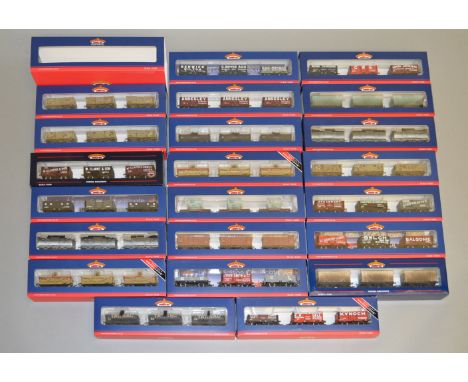 OO gauge. 22 x Bachmann rolling stock three-packs, some weathered, Collector's Club and Model Zone exclusives. E and boxed.