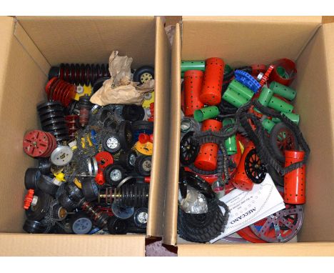 A very good quantity of vintage Meccano and other loose  parts, contained in four boxes, including  wheels, tyres, motors, tr