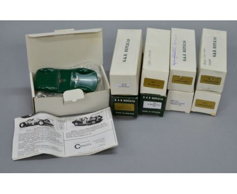 Eight K&R Replicas white metal model kits, all cars. Together with one other plastic car kit. Contents not checked.