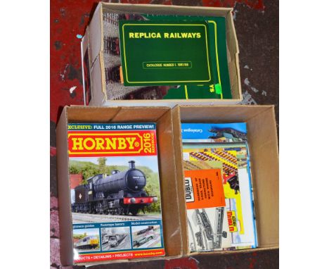 A good quantity of model railway catalogues from various manufacturers iincluding Hornby, Bachmann and Dapol, contained in th