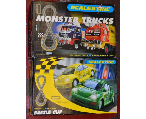 Two boxed Scalextric Slot Car Sets, 'Monster Trucks' and  'Beetle Cup' , condition of items and outer packaging varies. (2)