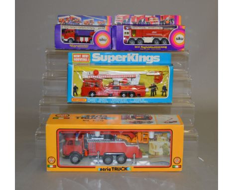 Two boxed Siku diecast Fire Engine models, 2819 and 3411, together with  a boxed Matchbox Super Kings K-39 Snorkel Fire Engin