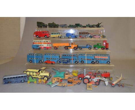 Twenty six unboxed playworn diecast models by Dinky, Corgi and others together with a number of smaller scale models by Match