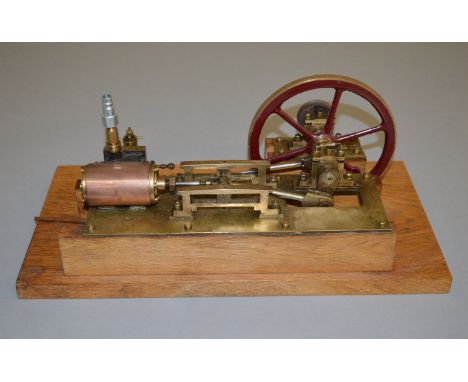 Well built Horizontal steam engine. Mounted on a wooden base 22 x 45cm. 6" Flywheel