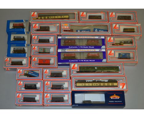 OO gauge. Assorted rolling stock: five Dapol wagons (including two twin packs); Bachmann wagon; four Lima coaches; 16 x Lima 