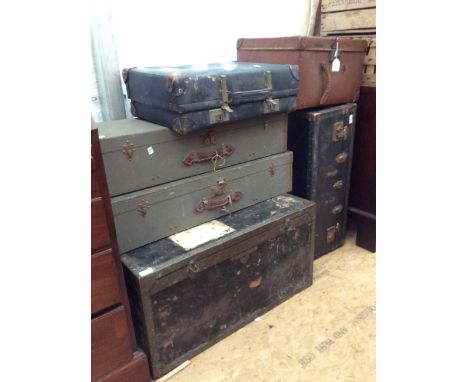 AN EARLY 20TH CENTURY TRAVELLING CASE, two leather bound cases, a suitcase and a trunk together with a quantity of shoe lasts