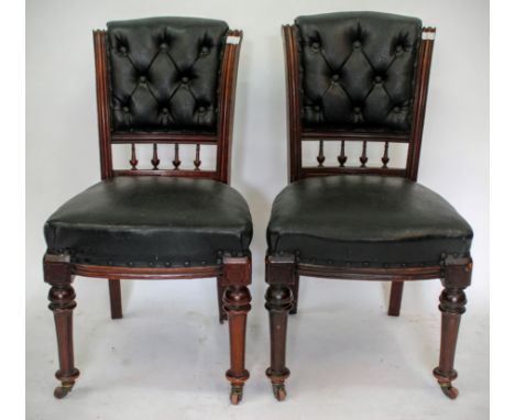 A SET OF SIX VICTORIAN MAHOGANY DINING CHAIRS with button upholstered backs and seats, on turned legs and castors and a dinin